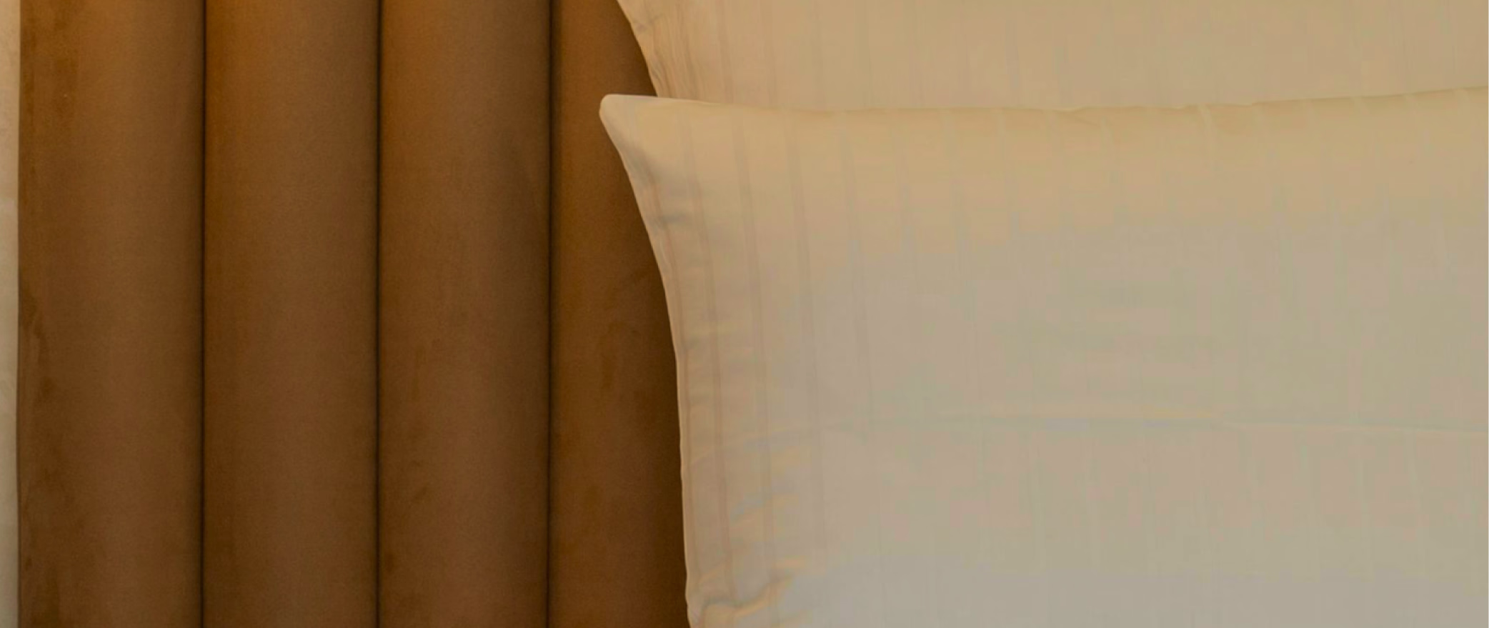 A pillow on a bed